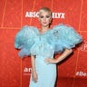 Katy Perry poses on the red carpet before receiving the Award of Courage at the 2018 amfAR Gala Los Angeles on October 18, 2018  at the Wallis Annenberg Center for the Performing Arts in Beverly Hills, Calif.