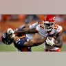 Kansas City Chiefs Chris Conley stiff arms Denver Broncos Chris Harris during the second half of an NFL football game in Denver, Oct. 1, 2018.