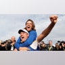 Team Europe's Ian Poulter celebrates with Tommy Fleetwood after winning the Ryder Cupat the Le Golf National in Guyancourt, France, Sept. 30, 2018.