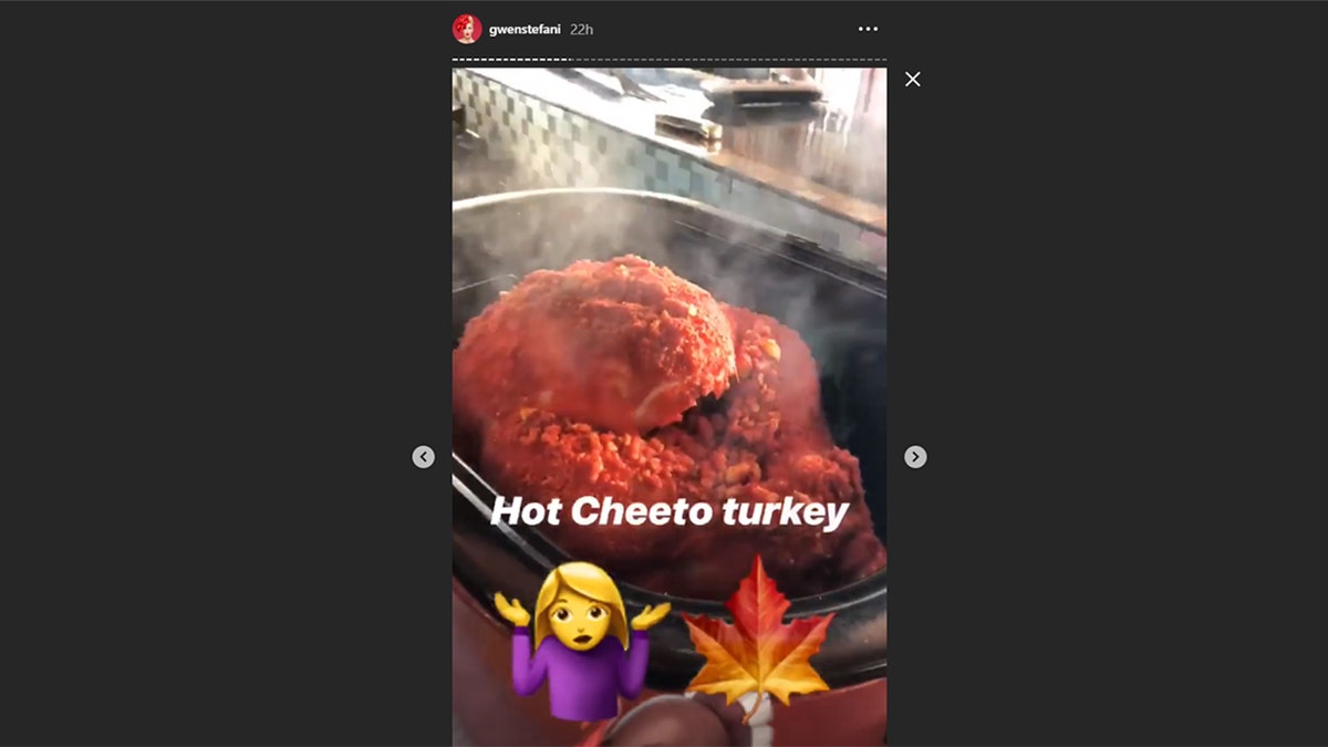 Stefani shows off her Flamin' Hot Cheetos Thanksgiving turkey.