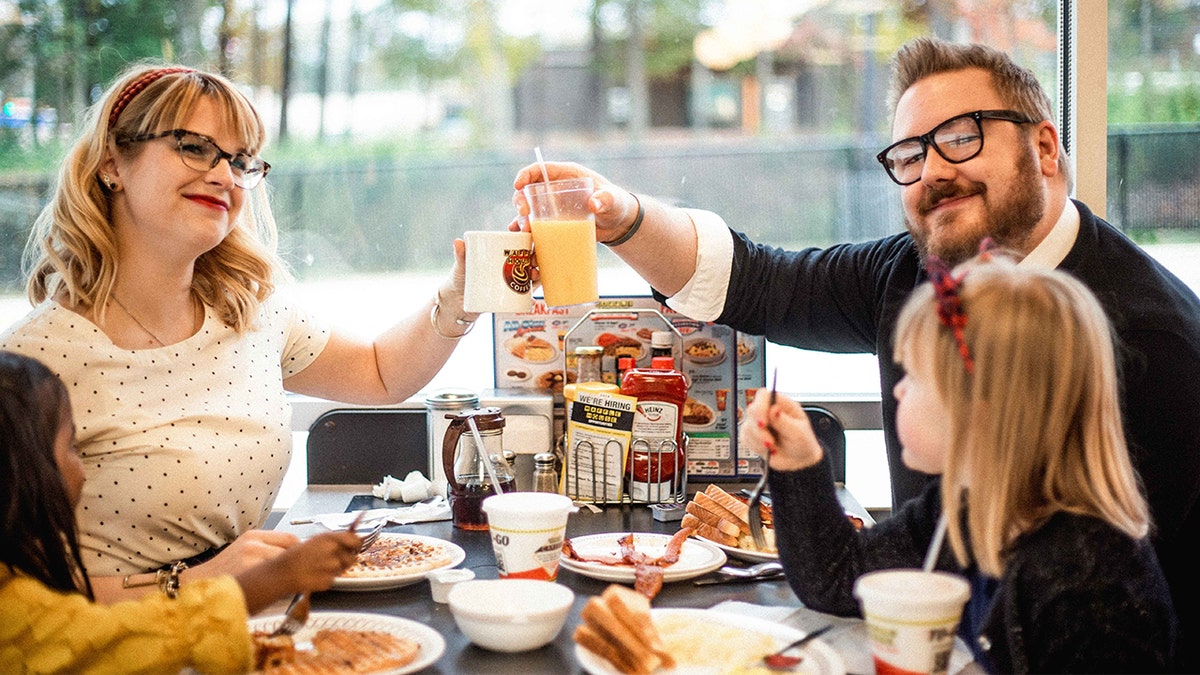 When Zack and Malinda Nichols were planning the photoshoot for their 2018 Christmas card with their two young daughters, they just couldn’t get excited about a traditional yuletide theme.