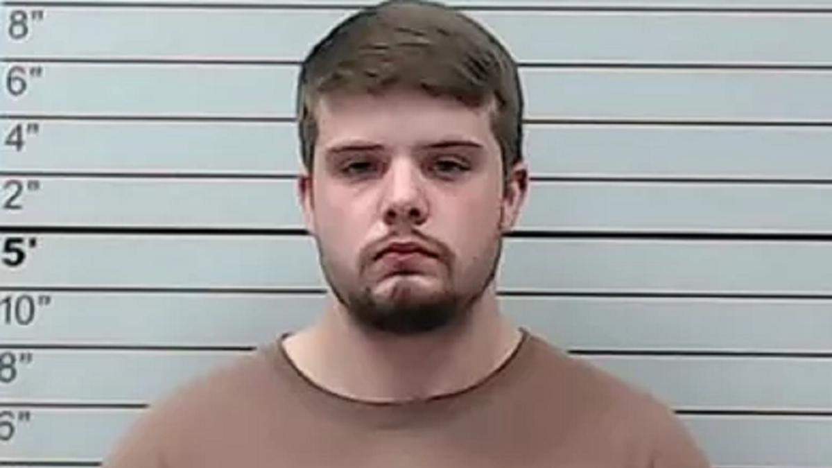 Hunter Newman, 22, allegedly hit a 9-year-old boy who was crossing a street to board a school bus.