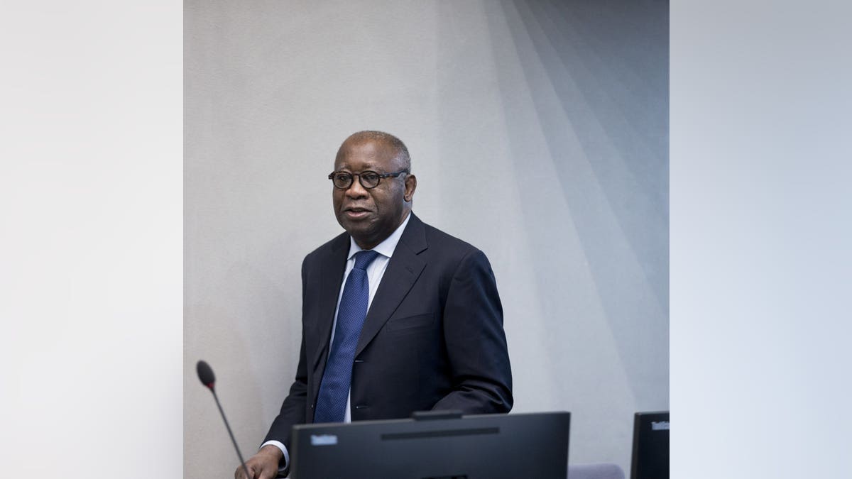 In this Thursday, Jan. 28, 2016 image, former Ivory Coast president Laurent Gbagbo arrives for the start of his trial at the International Criminal Court in The Hague, Netherlands.