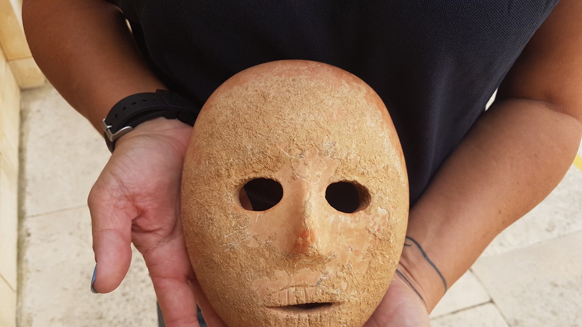 The ancient mask was discovered on the West Bank. (Antiquities Theft Prevention Unit, Israel Antiquities Authority)<br><br>