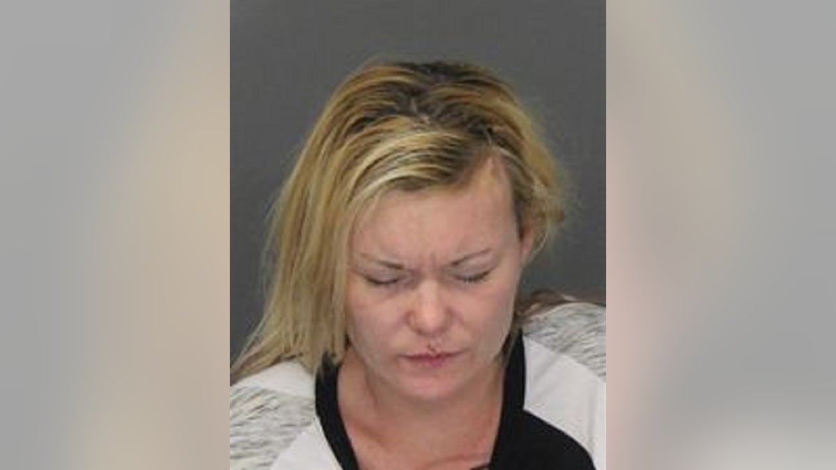 Sylvia Hope Verellen, 33, was arrested Saturday, accused of drunkenly assaulting police. She also swallowed diamond earrings that belonged to her boyfriend's deceased mother, police said.