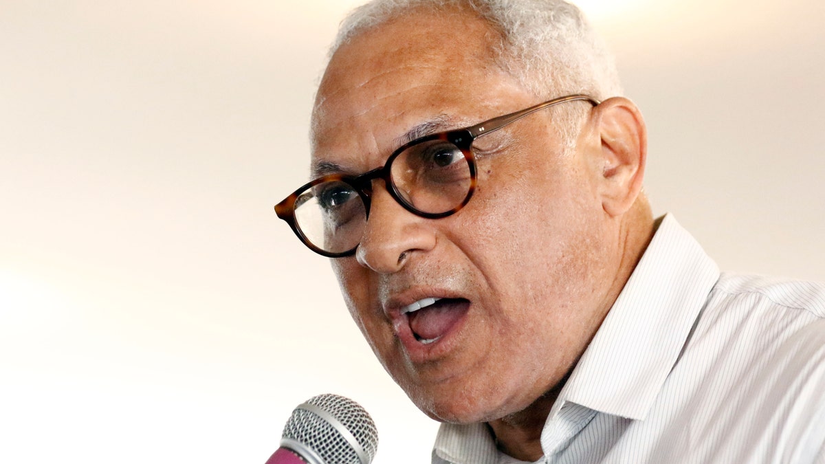 Mike Espy, a former congressman and former U.S. agriculture secretary, speaks at the Neshoba County Fair, one of Mississippi's largest political events. (AP Photo/Rogelio V. Solis, File)