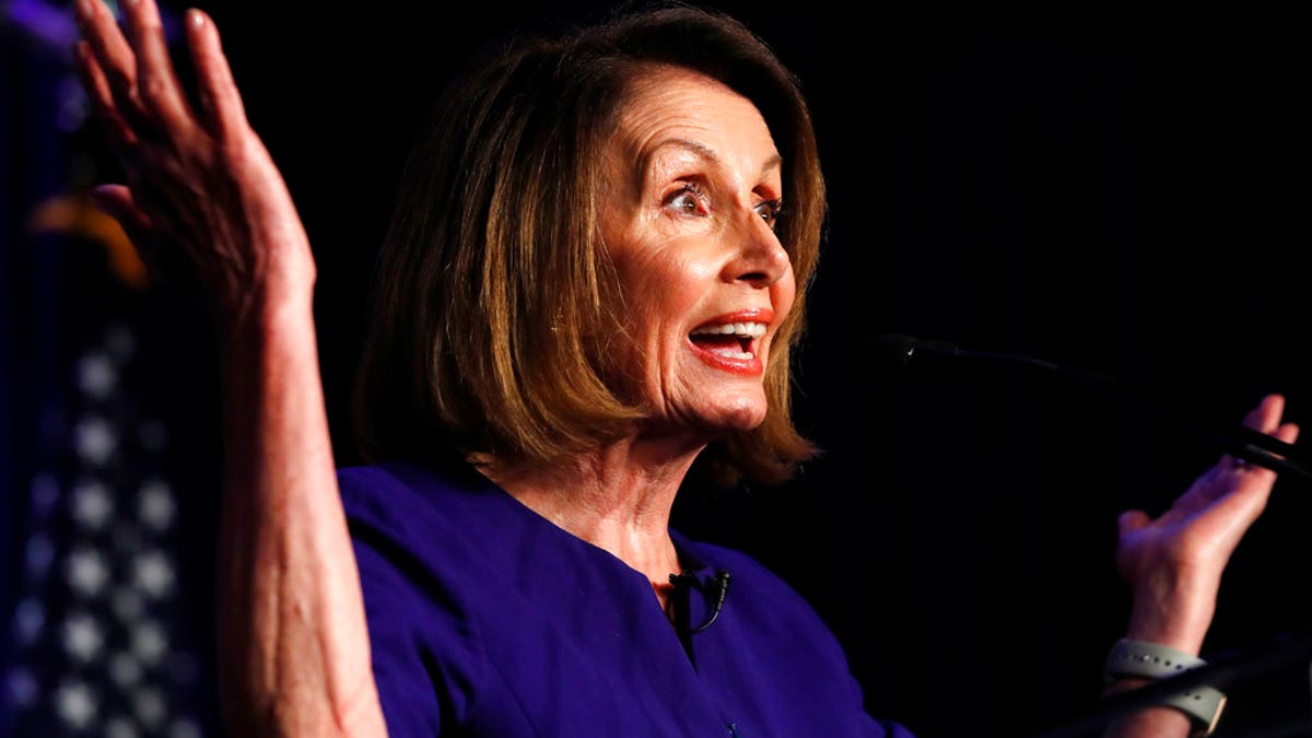 House Democratic Leader Nancy Pelosi of Calif., speaks to a crowd of volunteers and supporters of the Democratic party at an election night returns event at the Hyatt Regency Hotel, on Tuesday, Nov. 6, 2018, in Washington.