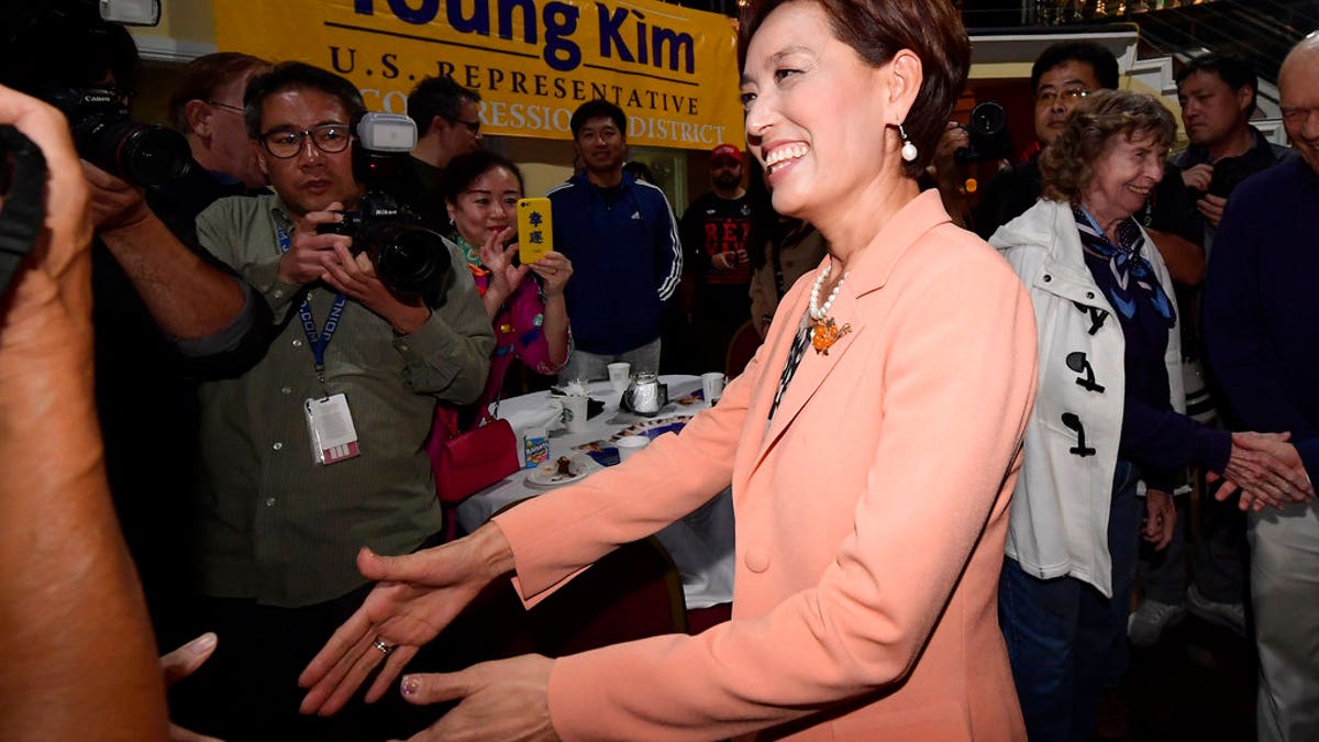 Young Kim, Republican candidate for the 39th Congressional District in California, greets supporters .