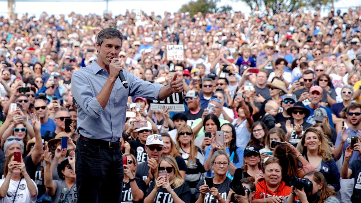 FILE - In this Nov. 4, 2018, file photo, Beto O'Rourke, the 2018 Democratic candidate for U.S. Senate in Texas, gives the thumbs up as he takes the stage to speak at the Pan American Neighborhood Park in Austin, Texas. O'Rourke didn't turn Texas blue, but for the first time in decades, it's looking much less red. Texas has long been a laboratory of conservatism. But cracks in the GOP's supremacy are emerging. The results could reverberate nationally. (Nick Wagner/Austin American-Statesman via AP, File)