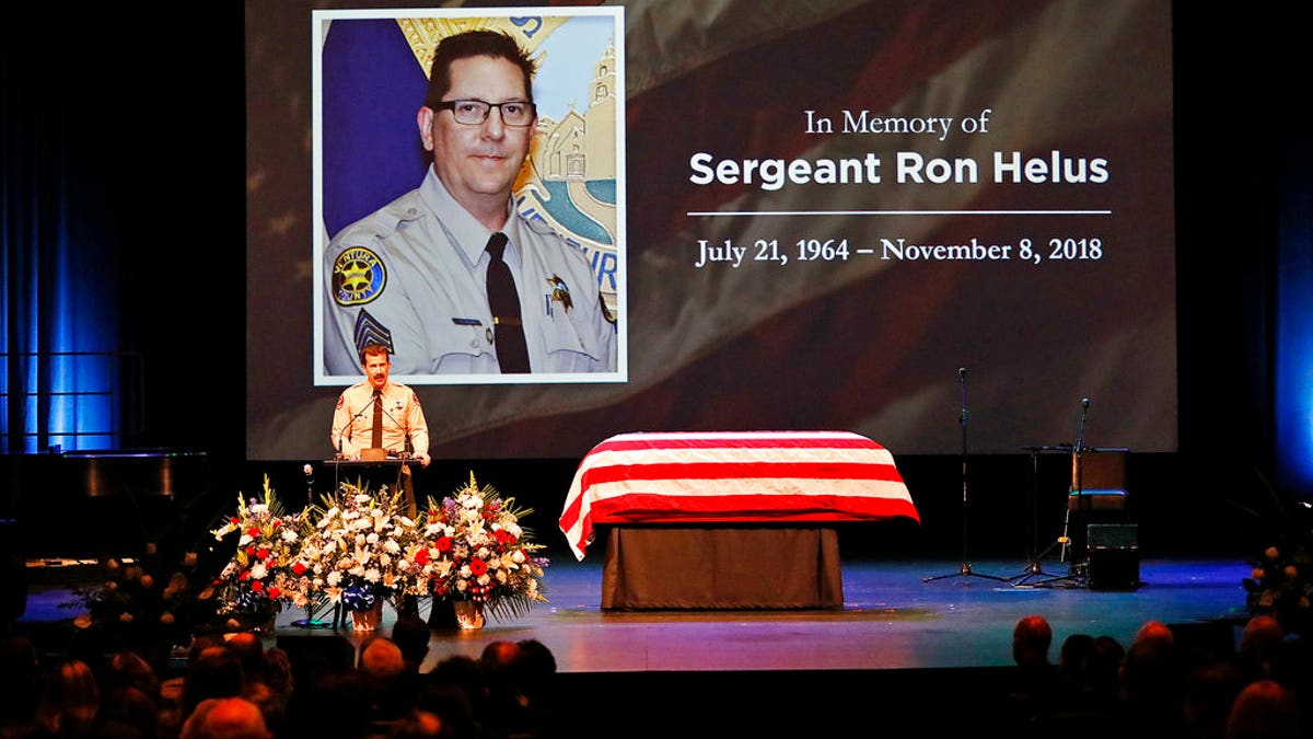 Ventura County Sheriff Biull Ayub addressing the crowd attending the memorial service for Ventura County Sheriff Sgt. Ron Helus at Calvary Community Church in Westlake Village, Calif., Thursday, Nov. 15, 2018. Sgt. Helus was one of twelve victims of the Borderline Bar & Grill mass shooting in Thousand Oaks last week. (Al Seib /Los Angeles Times via AP, Pool)