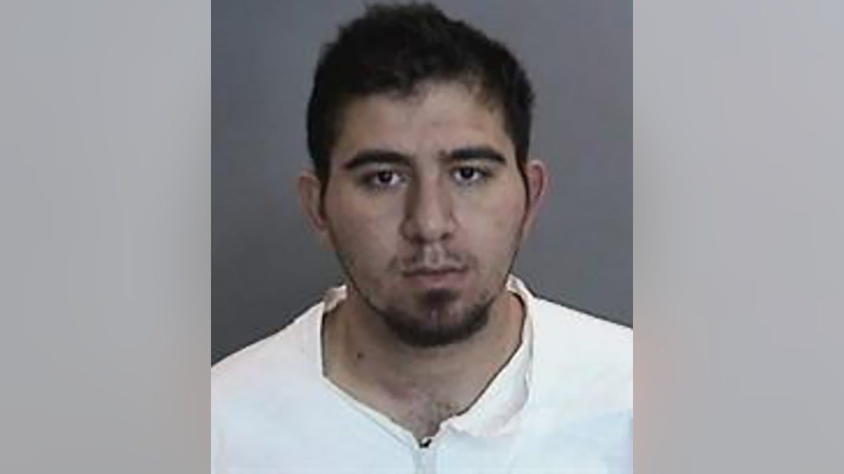 Amer Alhasan, 28, was arrested Wednesday just hours before allegedly fleeing the country, police said.