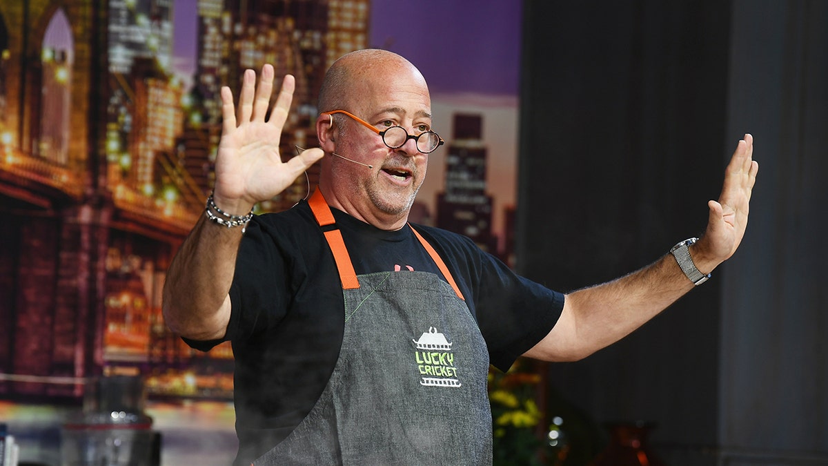 Celebrity Chef Andrew Zimmern said he didn't shower for a year and slept on the floor in an abandoned house while battling addiction.