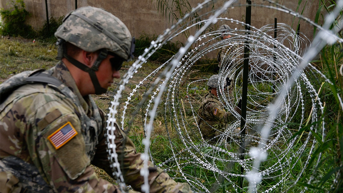 President Trump on Saturday referred to the barbed wire as "beautiful" and said that "barbed wire used properly can be a beautiful sight."