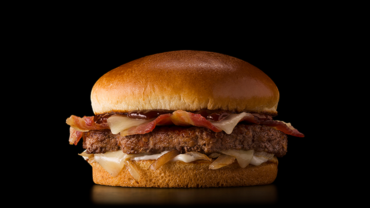 This McDonald’s is expanding its international menu again with menu items from India, Australia, France, Canada, and Germany - like this Cheddar BBQ Bacon Burger.