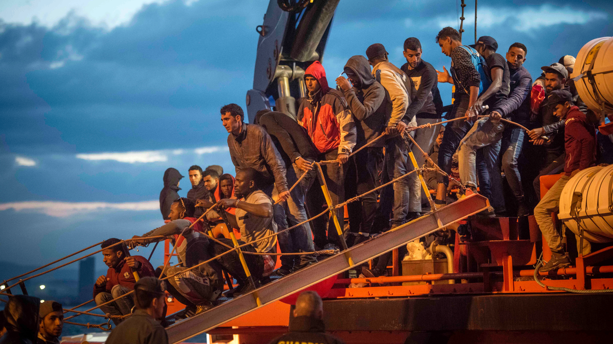 In this photo taken on Saturday, Oct. 27, 2018, migrants arrive at the port of San Roque, southern Spain, after being rescued by Spain's Maritime Rescue Service in the Strait of Gibraltar. (AP Photo/Marcos Moreno)