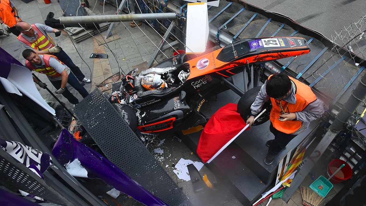Sophia Floersch of Germany and the Van Amersfoort Racing team is seen after crashing into a platform for media during the last day of the 65th Macao Grand Prix at Guia Circuit on November 18, 2018 in Macao, China.