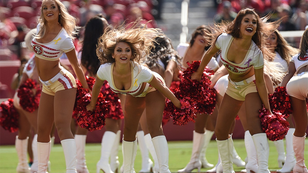 San Francisco 49ers cheerleader takes a knee before game against