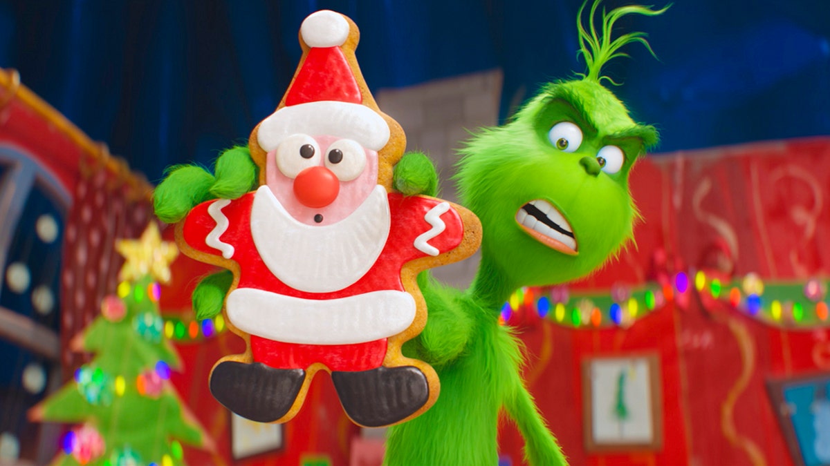 This image released by Universal Pictures shows the character Grinch, voiced by Benedict Cumberbatch, in a scene from "The Grinch." (Universal Pictures via AP)