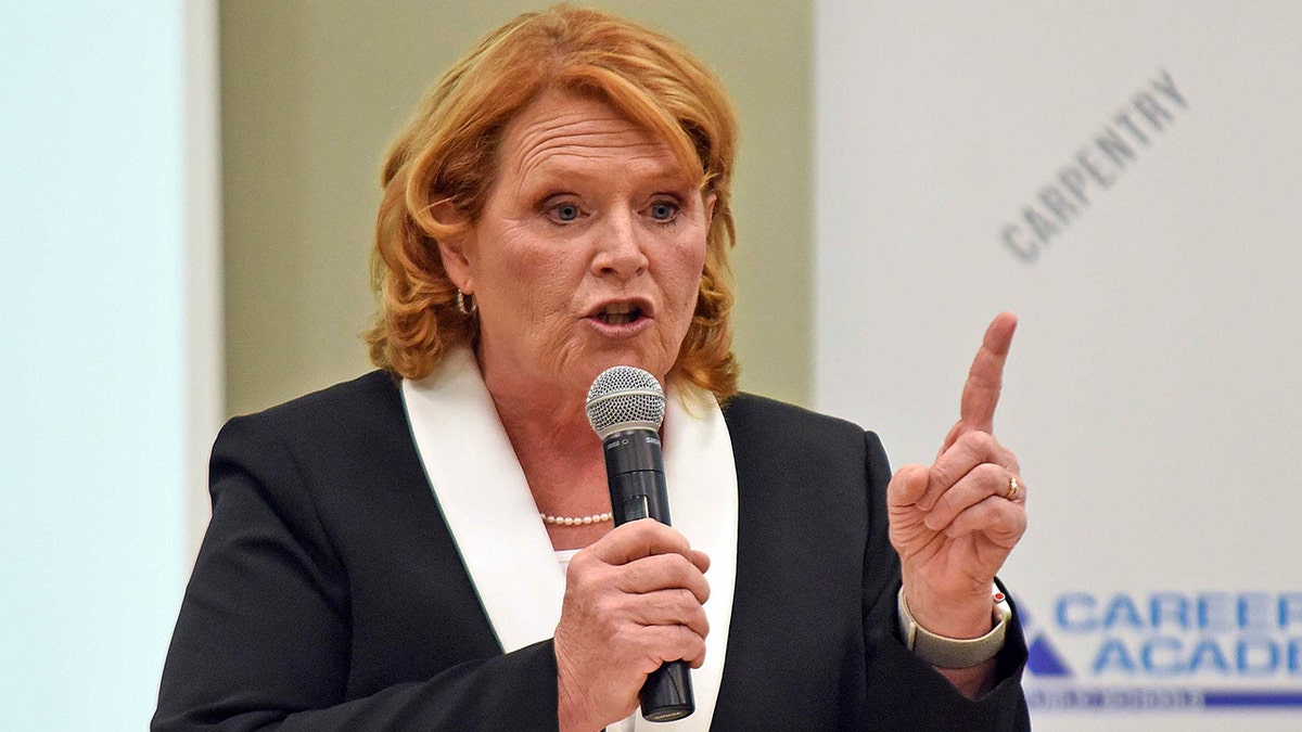 North Dakota Democratic U.S. Sen. Heidi Heitkamp makes a point in a debate with Republican Rep. Kevin Cramer.