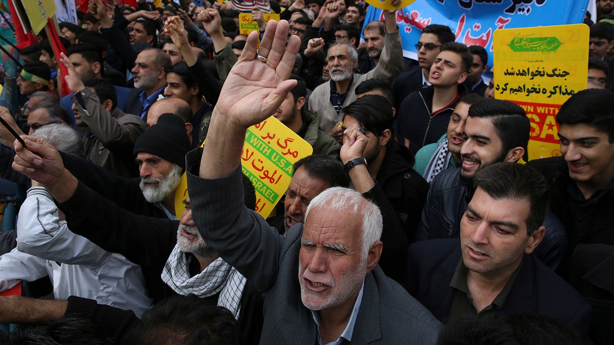 Demonstrators chant slogans during an annual rally in front of the former U.S. Embassy in Tehran on Sunday to mark the 39th anniversary of the seizure of the embassy by militant Iranian students. (AP Photo/Vahid Salemi)