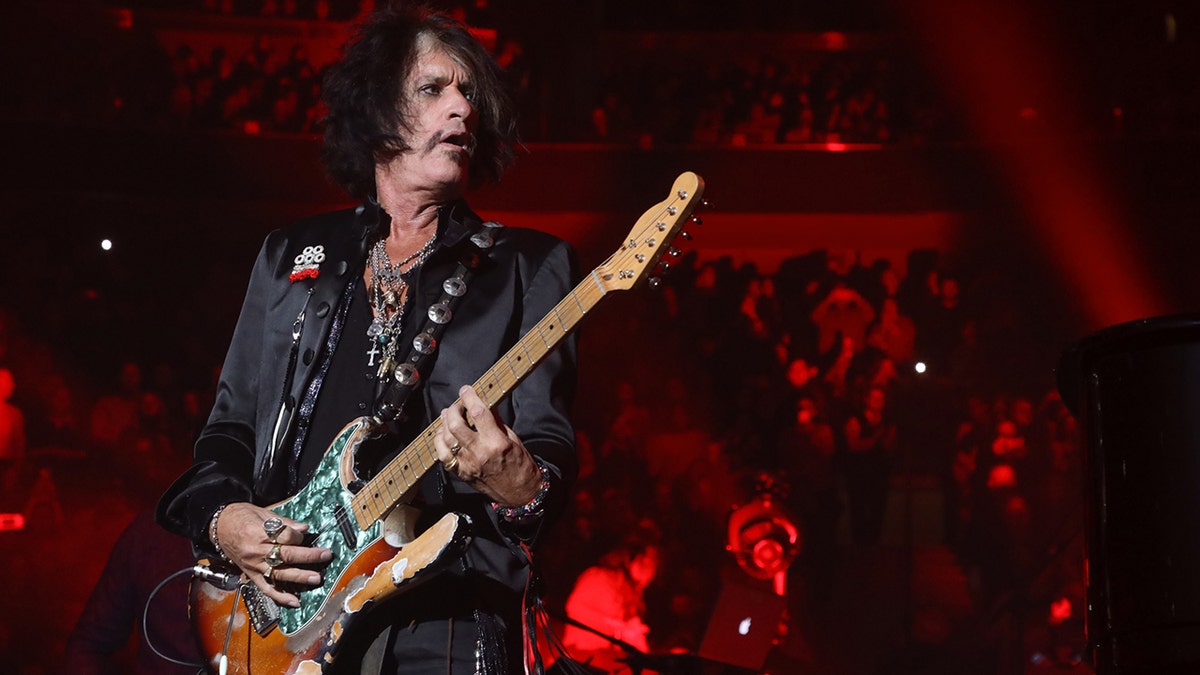Aerosmith's Joe Perry plays "Walk This Way" with Billy Joel at Billy Joel's 104th Show at Madison Square Garden on November 10, 2018 in New York City.