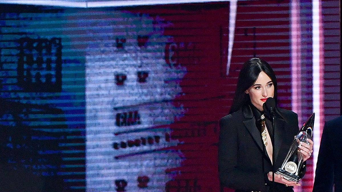 Musgraves gives an emotional acceptance speech while accepting the Album of the Year award at the CMAs. 