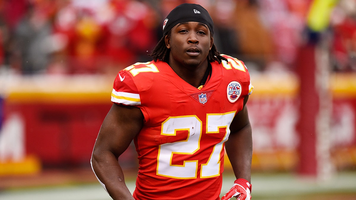 Running back Kareem Hunt, No. 27 with the Kansas City Chiefs, runs to the sidelines just before kickoff in the game against the Miami Dolphins at Arrowhead Stadium on Dec. 24, 2017, in Kansas City, Missouri (Photo by Jason Hanna/Getty Images).