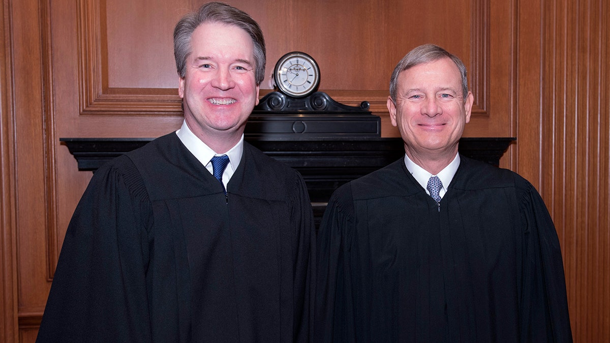 Associate Justice Brett Kavanaugh with Chief Justice John Roberts.