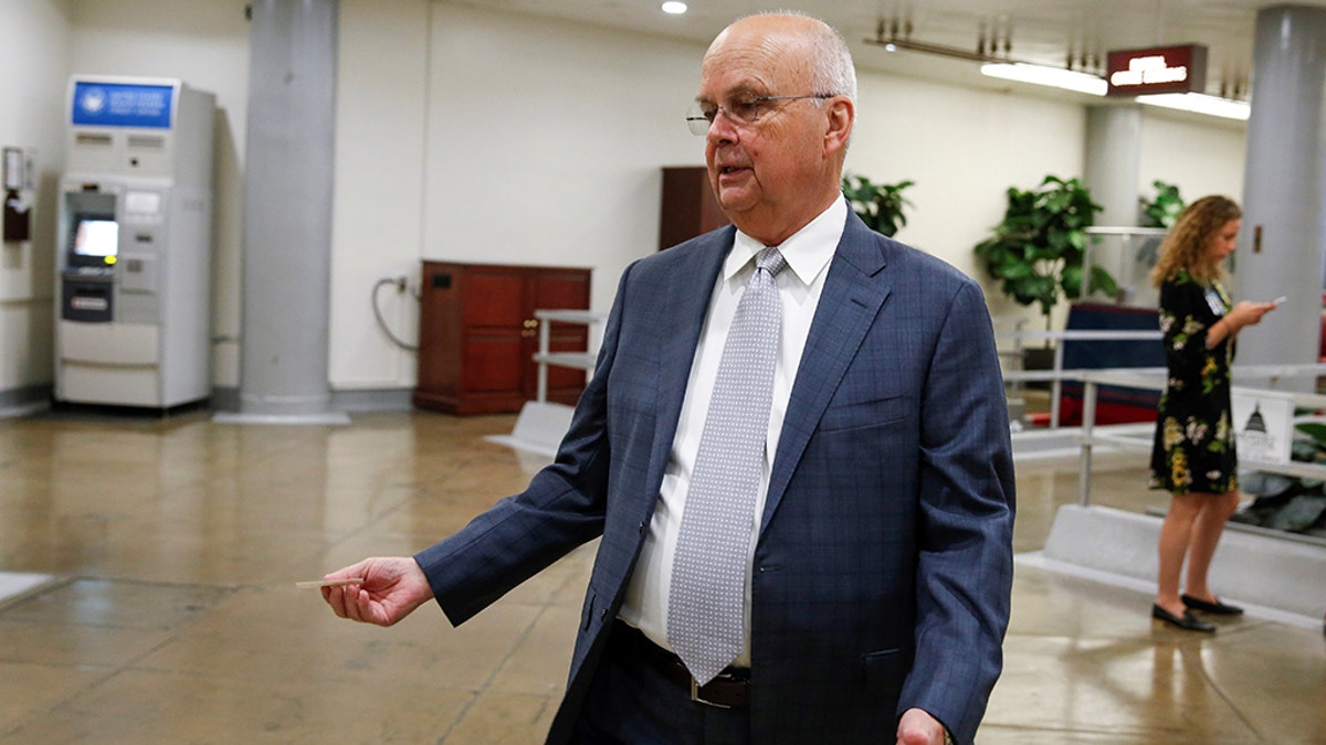 Former intelligence official Michael Hayden walks in the U.S. Capitol in Washington, August 22, 2018. (Reuters)