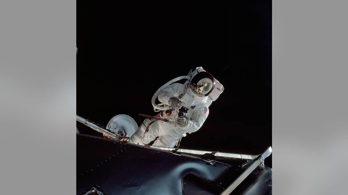 Astronaut Russell Schweickart performs a spacewalk on the fourth day of the Apollo 9 mission (NASA).