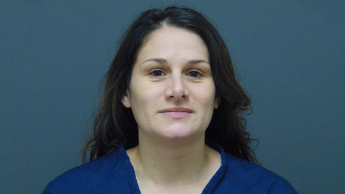 Samantha Baxter, 38, is accused of driving into a liquor store in Muskegeon Heights, Michigan, and seriously injuring a customer inside.