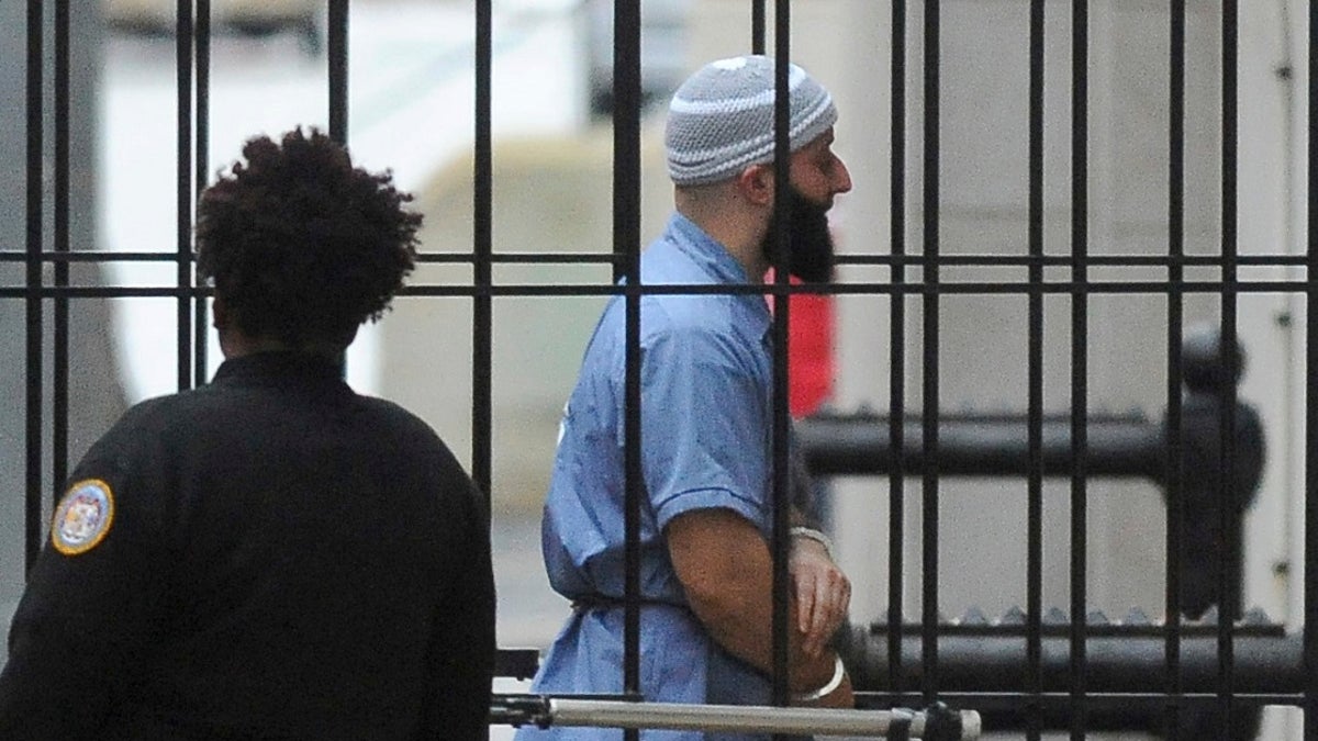 Adnan Syed enters Courthouse East prior to a hearing in Baltimore.