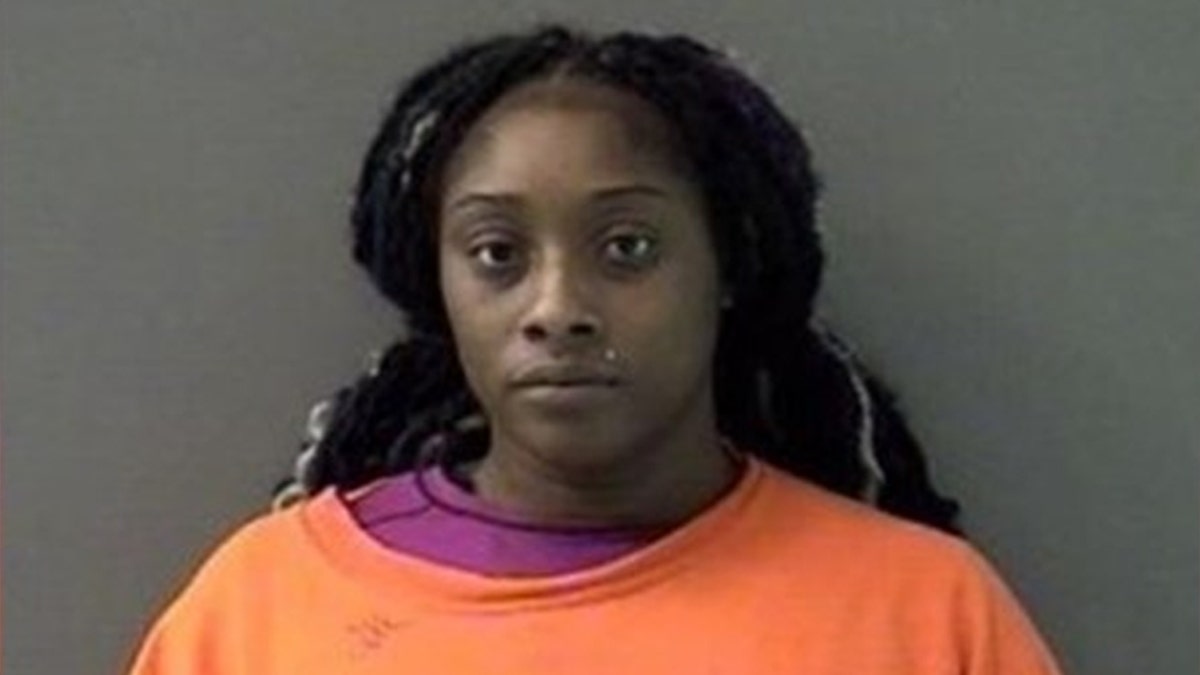 The Texas woman allegedly placed the dog's body in a dumpster following the alleged beating.