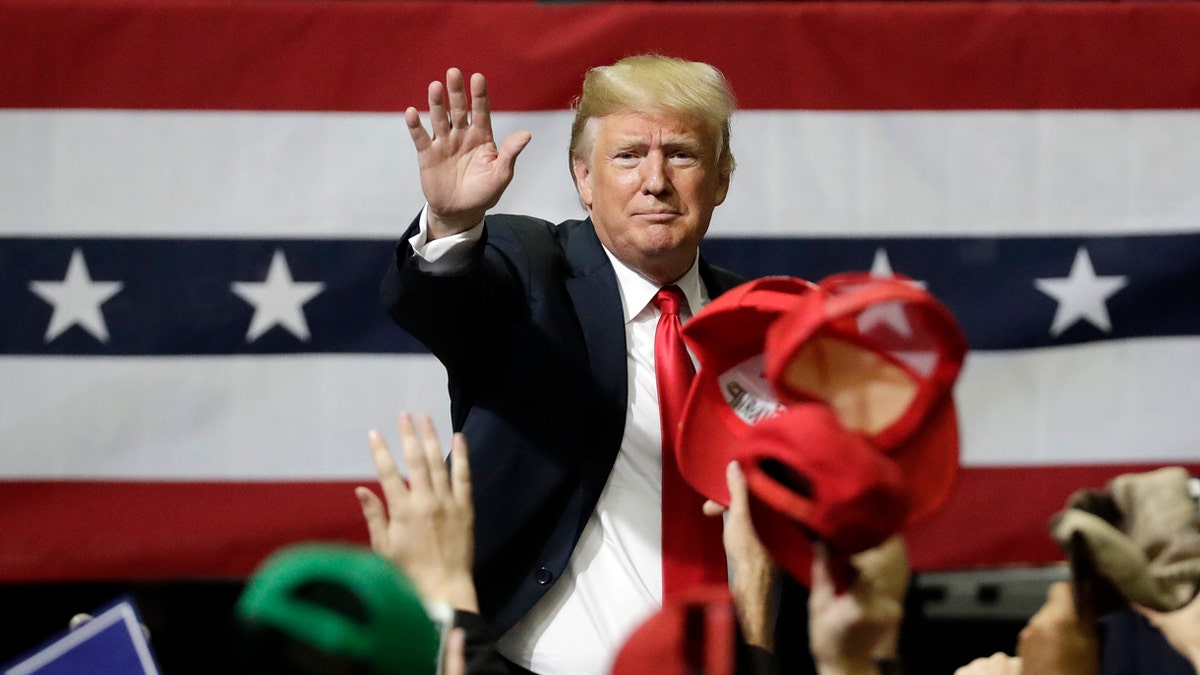President Donald Trump acknowledges the crowd as he leaves a rally Sunday, Nov. 4, 2018, in Chattanooga, Tenn. (AP Photo/Mark Humphrey)