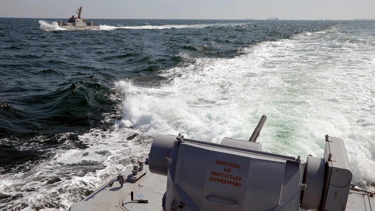 In this file photo taken and distributed by Ukrainian Navy Press Service on Sunday, Nov. 25, 2018, two Ukrainian forces navy ships are seen near Crimea. The Ukrainian navy says a Russian coast guard vessel rammed a Ukrainian navy tugboat near Crimea, damaging the ship's engines and hull. (Ukrainian Navy Press Service via AP)