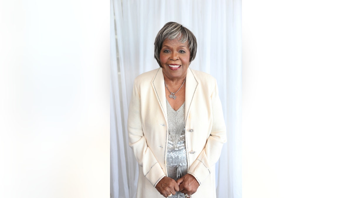 Vernita Lee poses for a photo at her 80th birthday party.