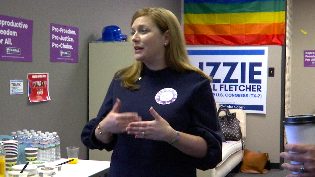 Democrat Lizzie Fletcher, who's looking to unseat Rep. John Culberson, speaks to volunteers at a campaign event in Houston.