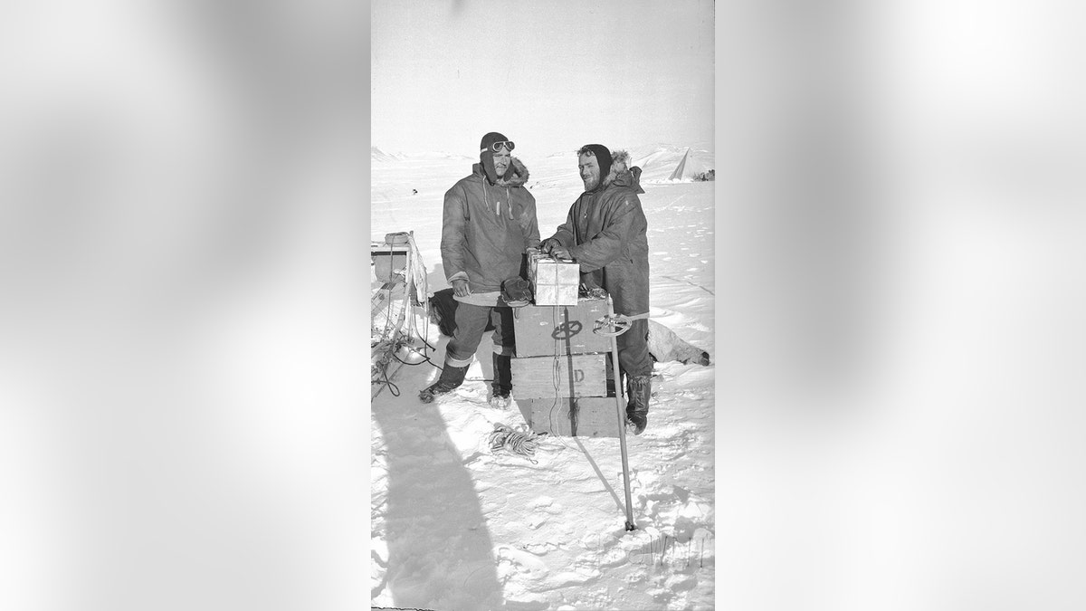 The end of the first sledge journey from Hope Bay: Victor Russell and David James. Launched in 1943, Operation Tabarin was an expedition to secretly establish bases, keep a watchful eye on German and Japanese activities, and curb opportunistic Argentinian incursions. (Credit: Natural Environment Research Council)