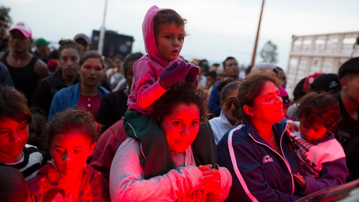 Thousands of Central American migrants were back on the move toward the U.S. border Saturday, after dedicated Mexico City metro trains whisked them to the outskirts of the capital and drivers began offering rides north.