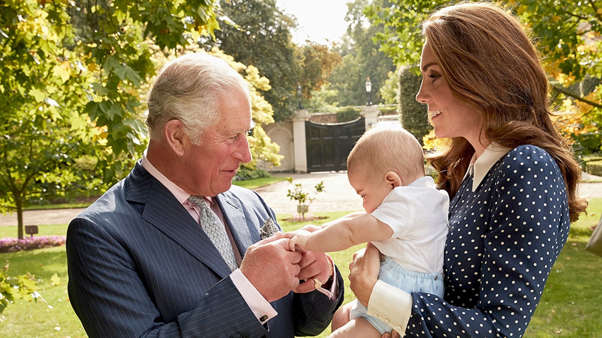 Images are part of a set to mark His Royal Highness's 70th birthday. Prince Charles, Prince of Wales with Prince Louis of Cambridge and Catherine, Duchess of Cambridge after a family portrait photo-shoot in the gardens of Clarence House on September 5, 2018 in London, England. (Chris Jackson/Getty Images for Clarence House).