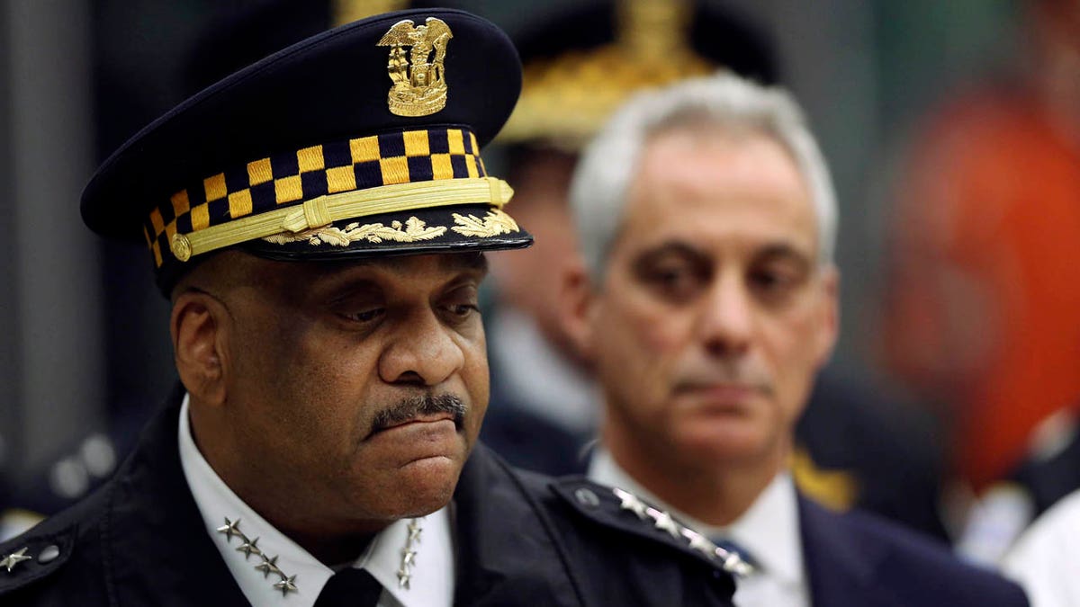 Chicago Police Superintendent Eddie Johnson, left, and Mayor Rahm Emanuel speak Monday, Nov. 19, 2018, during a news conference at the University of Chicago Medical Center, in Chicago.