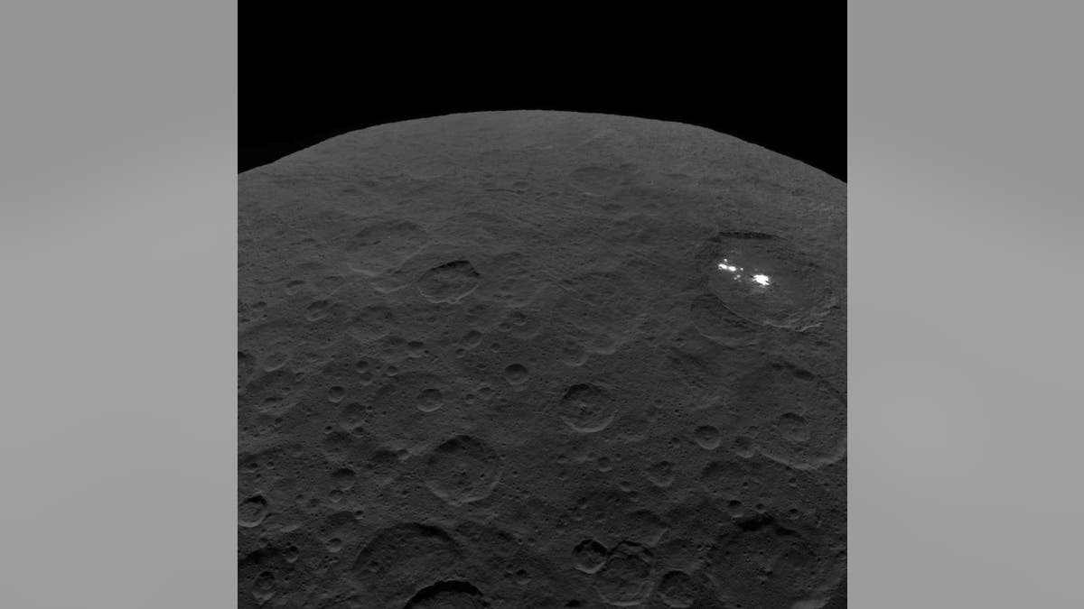 One of the last images of Ceres from NASA's Dawn spacecraft shows bright spots in Occator Crater. Dawn captured this view on Sept. 1, 2018, from an altitude of 2,340 miles (3,370 kilometers) above the dwarf planet's surface.