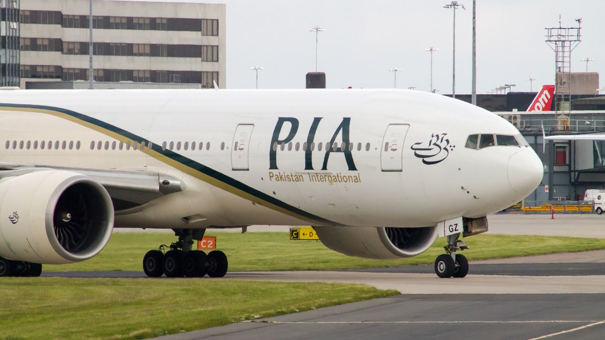 A Pakistan International Airlines customer was so upset with his flight, he tried to burn his clothes. 