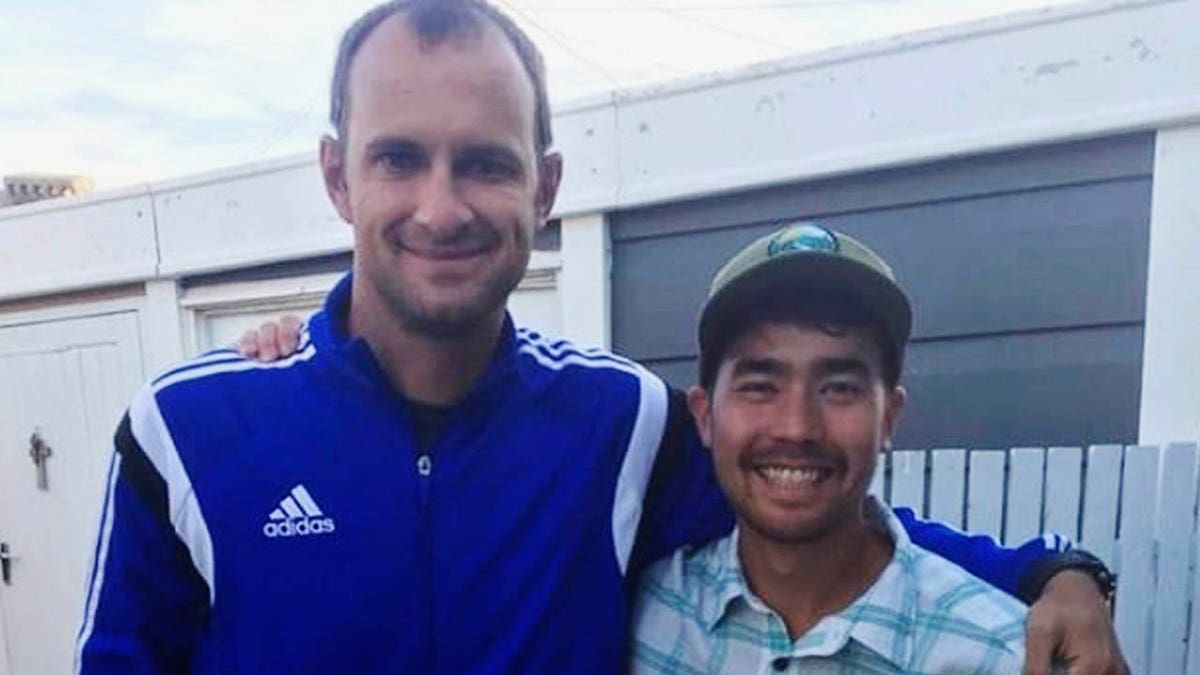 In this October 2018 photo, John Allen Chau with Founder of Ubuntu Football Academy Casey Prince, 39, in Cape Town, South Africa, days before he left for in a remote Indian island of North Sentinel Island, where he was killed.  