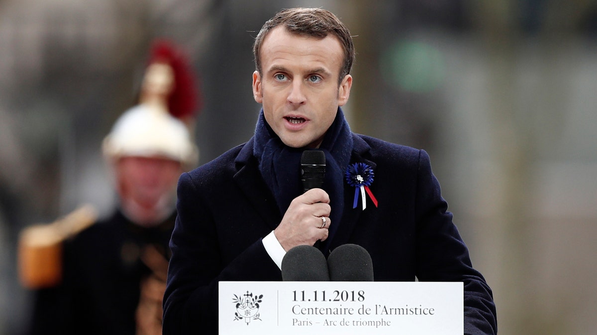 French President Emmanuel Macron delivers his speech as he attends a commemoration ceremony for Armistice Day, 100 years after the end of the First World War at the Arc de Triomphe in Paris, France, Sunday, November 11, 2018.