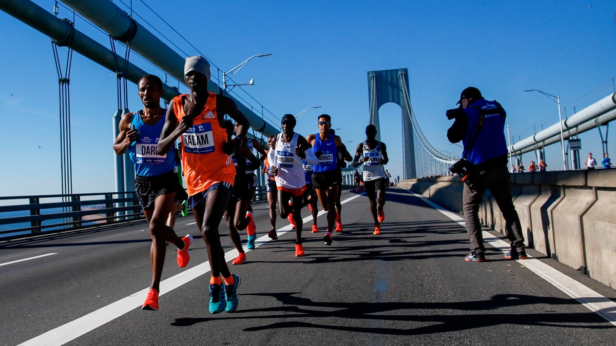 Elite men runners cross the Verrazano-Narrows Bridge during the New York City Marathon on Sunday, Nov. 4, 2018, in New York.