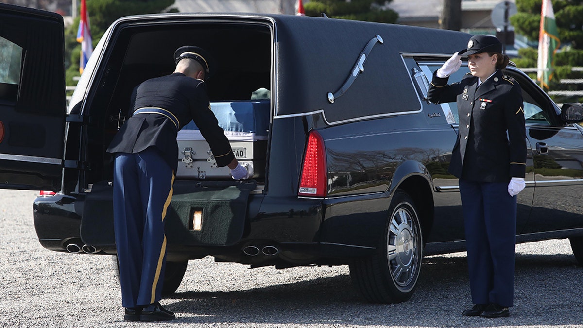 United Nations Command honor guards carry a coffin which contains the remains of a soldier who fought in the Korean War during a repatriation ceremony at Yangsan U.S. military base on November 20, 2018 in Seoul, South Korea. (Chung Sung-Jun/Getty Images)