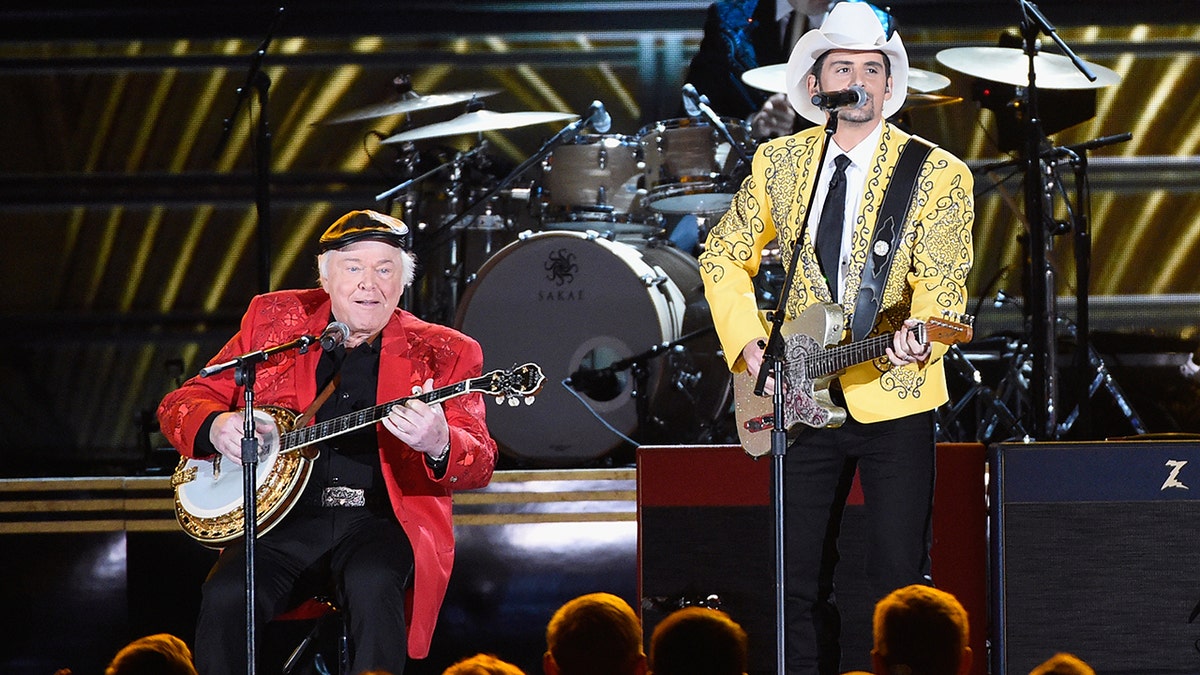 Roy Clark and Brad Paisley perform onstage at the 50th annual CMA Awards at the Bridgestone Arena on November 2, 2016 in Nashville, Tennessee.