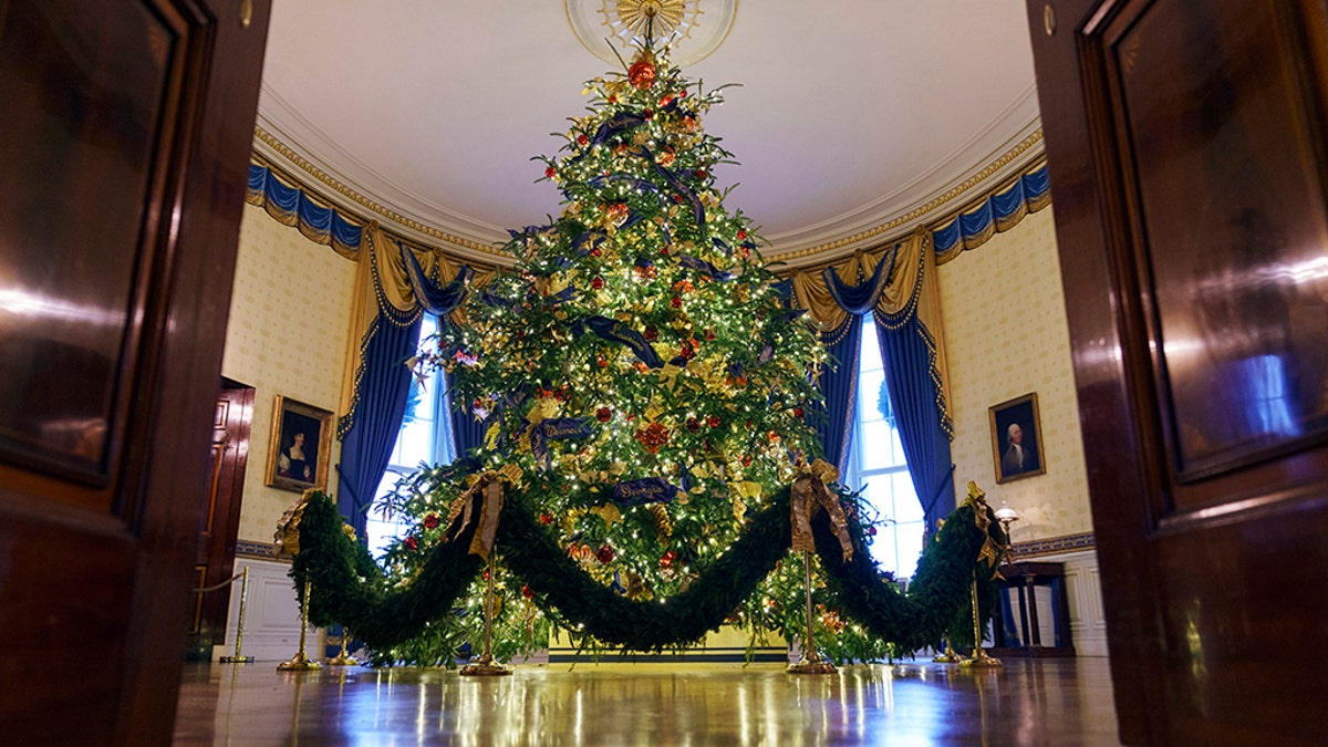 The official White House Christmas tree is seen in the Blue Room during the 2018 Christmas Press Preview at the White House.