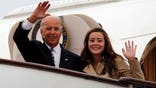 BEIJING, CHINA - AUGUST 17: U.S. Vice President Joe Biden (L) waves with his granddaughter Naomi Biden as they walk out from Air Force Two upon arrival at the Beijing Capital International Airport on August 17, 2011 in Beijing, China. Vice President Joe Biden, a veteran foreign policy hand during his 36-year Senate career, arrived for a five-day visit in China under a cloud of criticism over the U.S. debt, as he seeks to build a rapport with Xi Jinping, the man expected to be the rising Asian power's next leader. He will later visit emerging U.S. partner Mongolia and longstanding ally Japan. (Photo by Ng Han Guan-Pool/Getty Images)